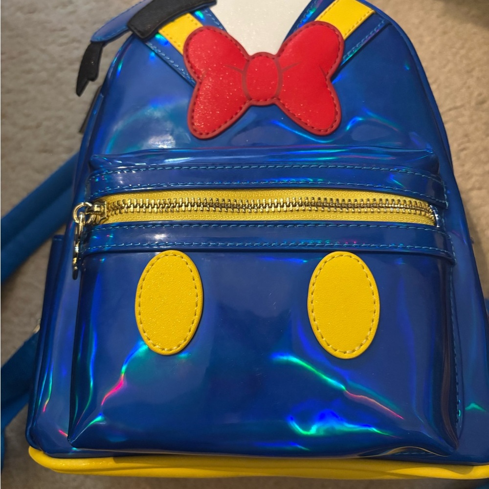 Loungefly Donald Blue Holographic Mini Backpack with Red Bow and Yellow Accents